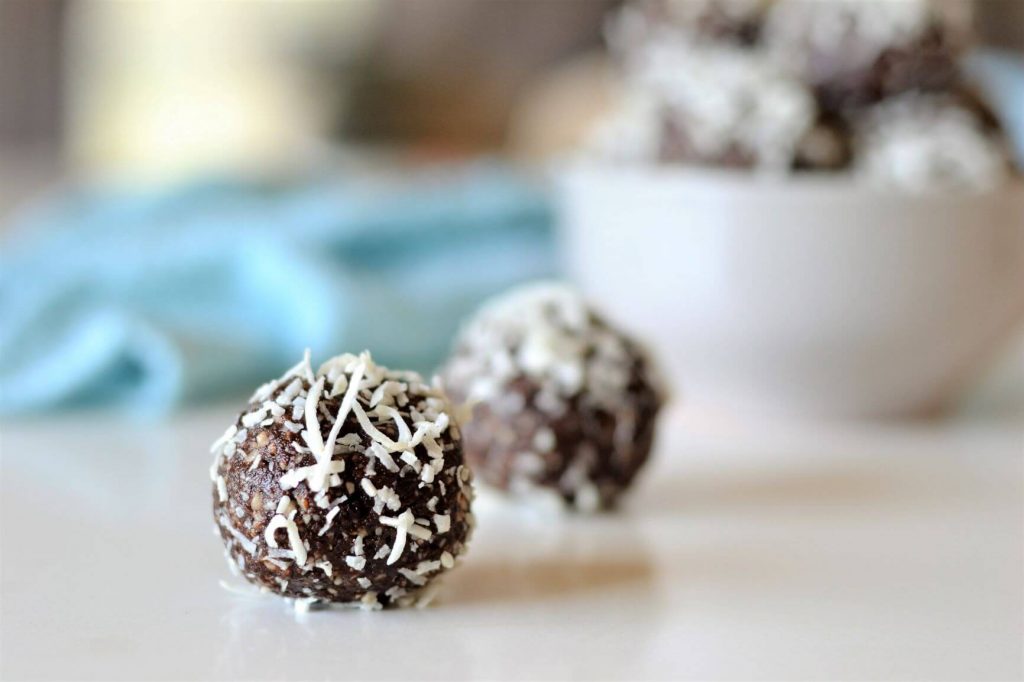 close up of chocolate ball with coconut