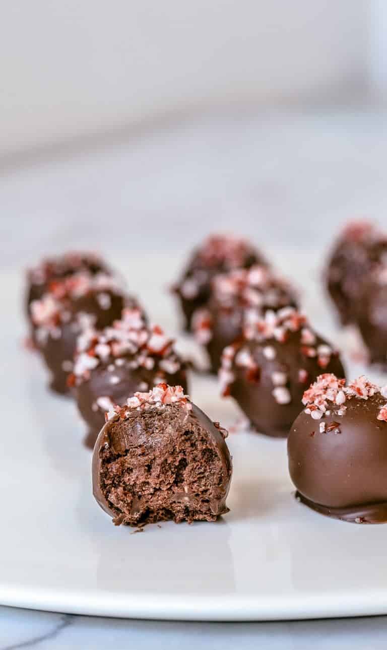 close up of chocolate truffles with crushed mint pieces