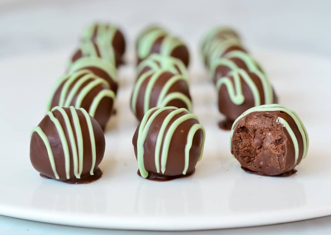 chocolate peppermint truffles on white plate