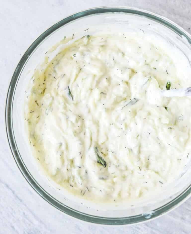 A bowl containing tzatziki, top view