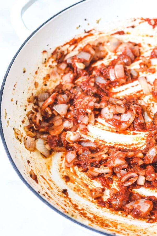 A plate of pasta coated in a classic smooth and creamy tomato sauce