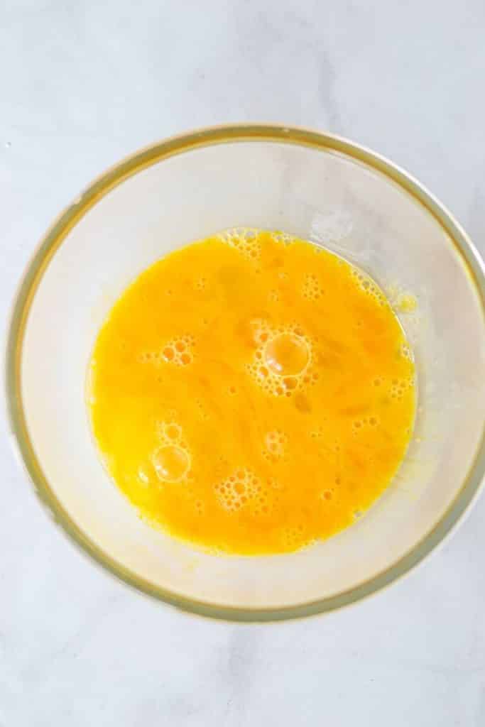 scrambled eggs in glass bowl
