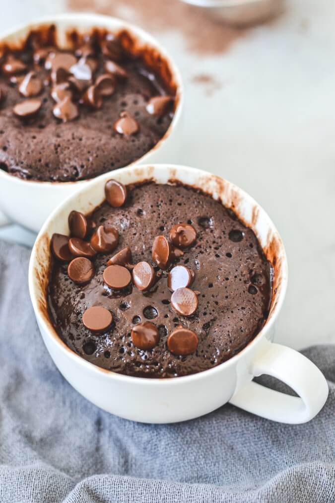 chocolate-cake-in-white-mug-topped-with-chocolate-chips