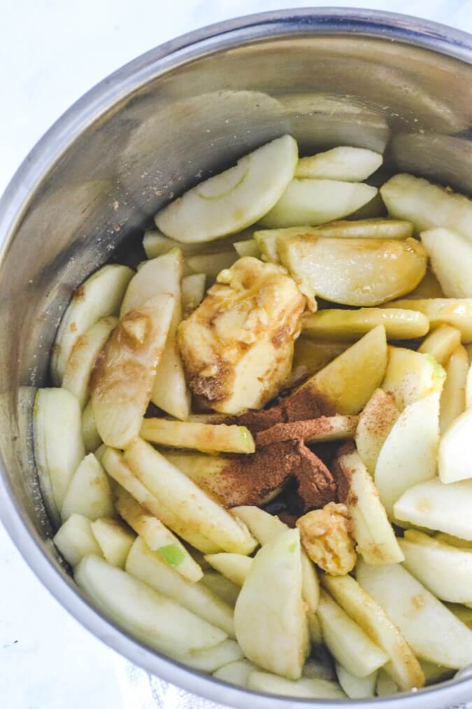 sliced-apple-and-spices-in-saucepan