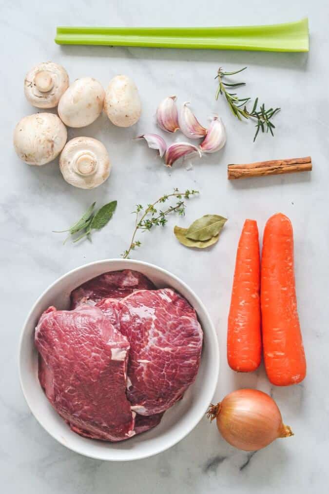ragu-ingredients-on-white-table