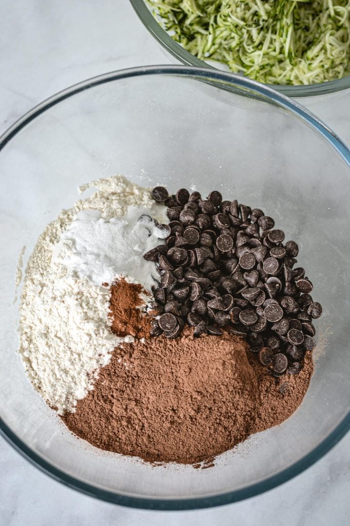 muffin ingredients in a glass mixing bowl