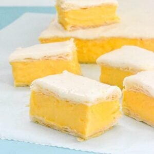 yellow-custard-slice-pieces-on-baking-paper