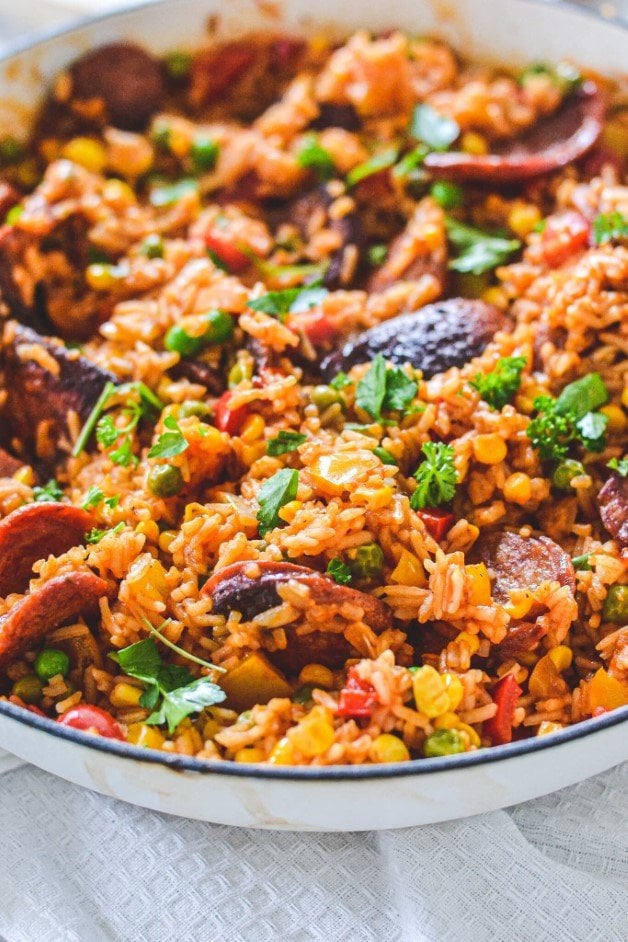 side-view-of-finished-rice-and-chorizo-in-white-pan