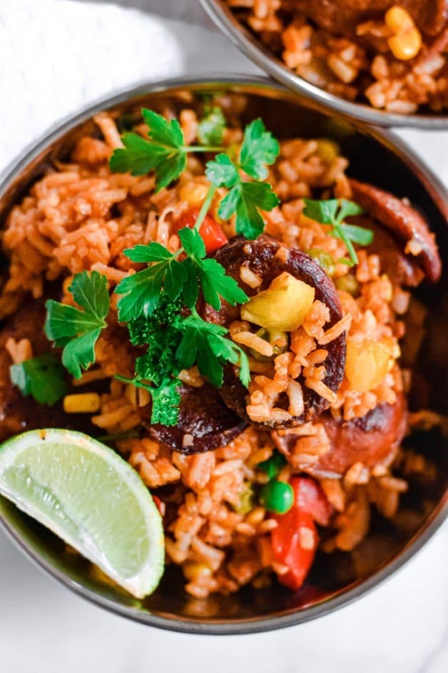 top-view-of-chorizo-and-rice-in-silver-bowl