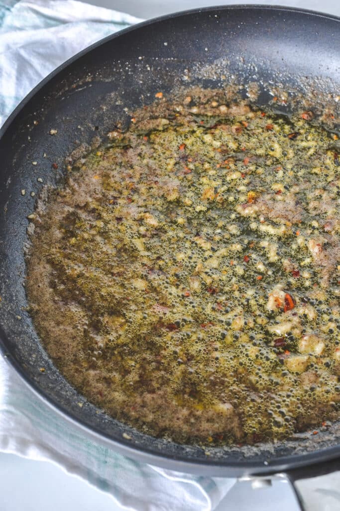 garlic and butter in frying pan