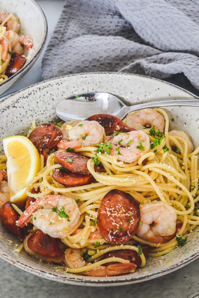 pasta-in-grey-bowl-with-prawns-and-chorizo