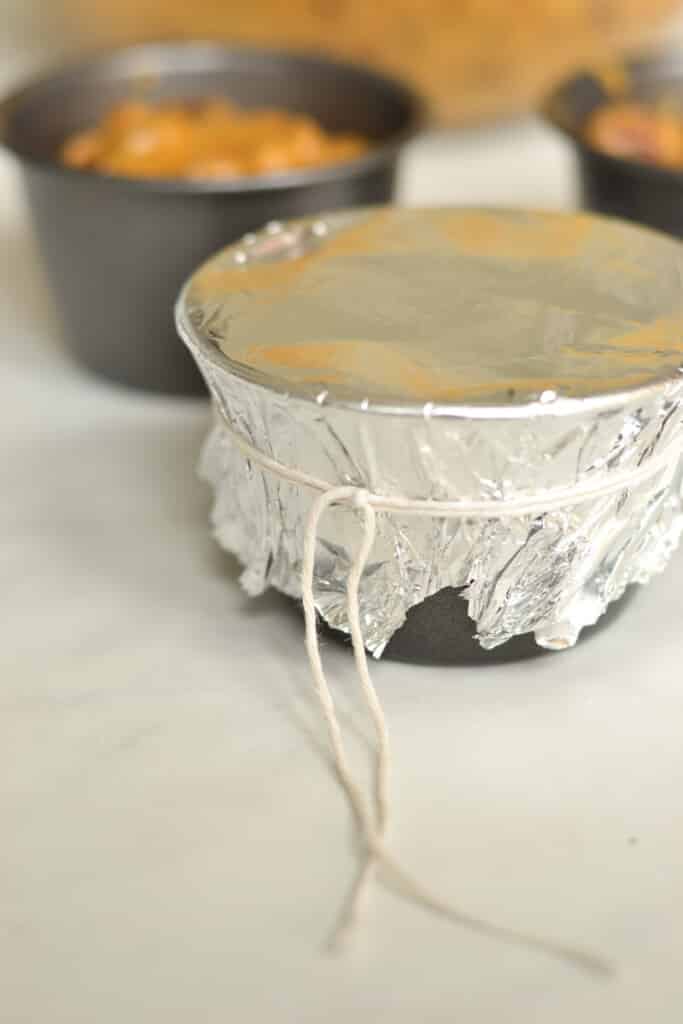 pudding mould covered with foil and tied with string