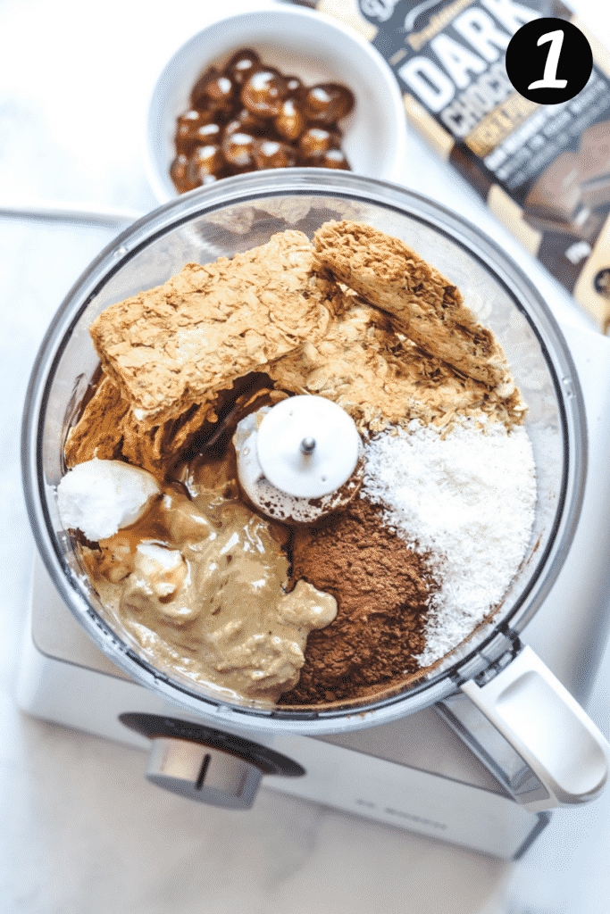 all ingredients for cherry ripe slice arranged in a food processor