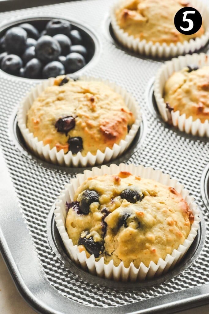 finished cupcakes in a metal tray.