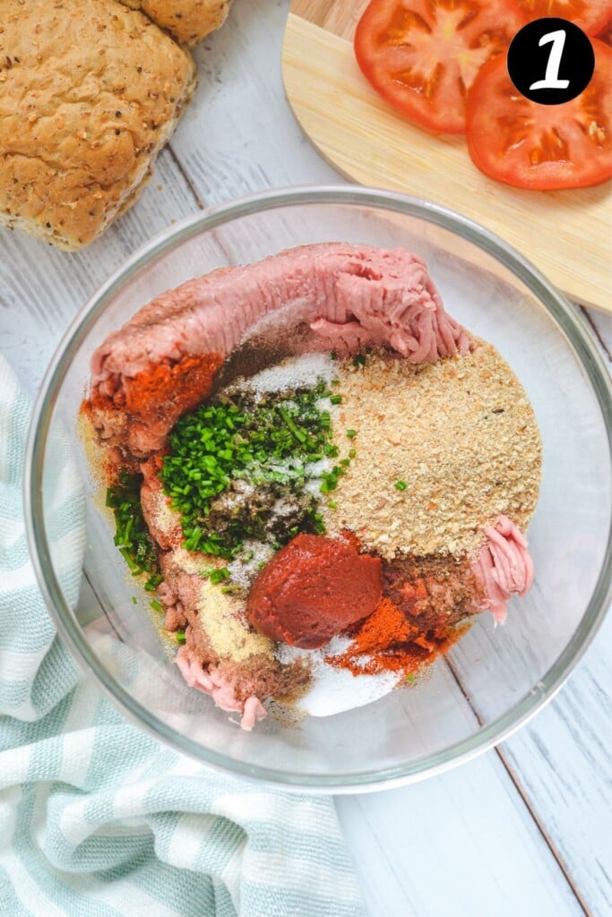 all ingredients for turkey patties in a glass bowl.