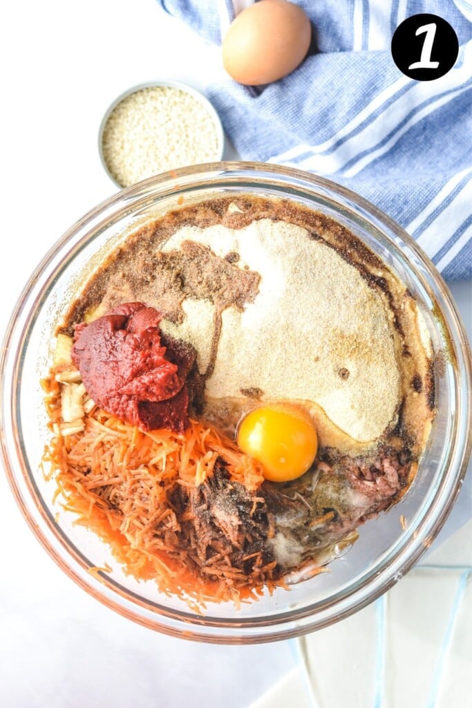 pork and sausage roll ingredients in a glass bowl