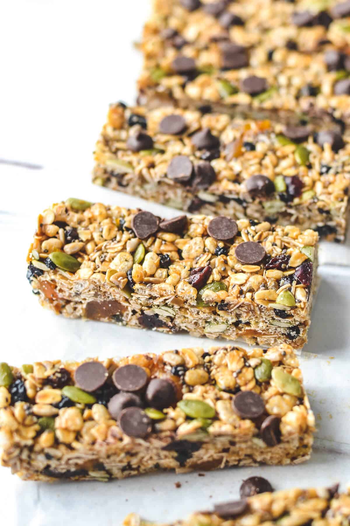 a row of muesli bars on a wooden board