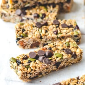 sliced muesli bars topped with chocolate chips on a white table