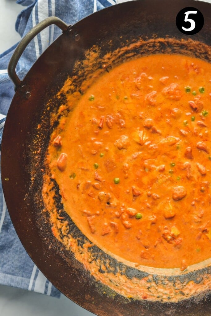vegetables simmering in tikka masala sauce