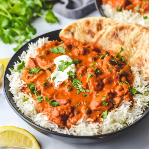 finished tikka masala with vegetables and roti bread