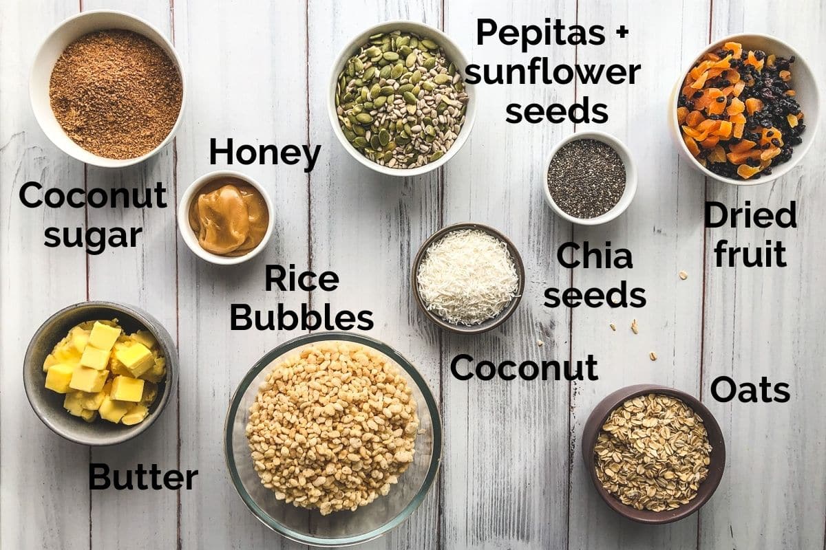 all ingredients for homemade muesli bars laid out on a table