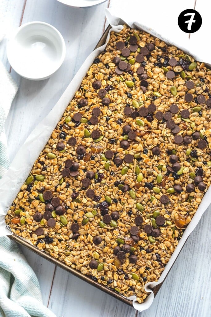 muesli bar mixture pressed into a tin