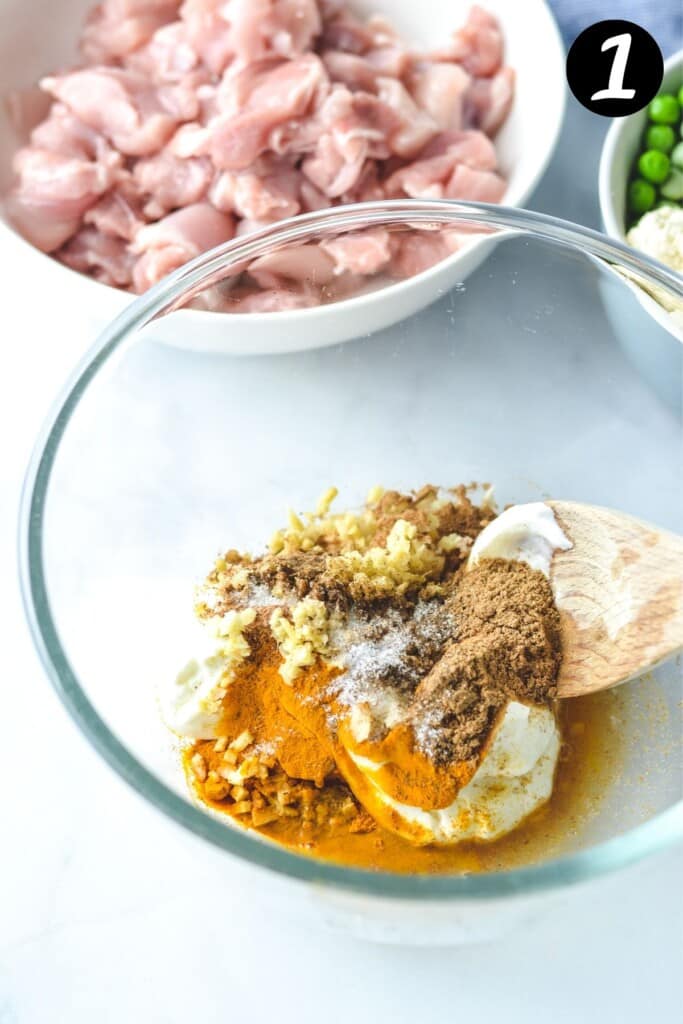 tikka masala marinade ingredients in a glass bowl