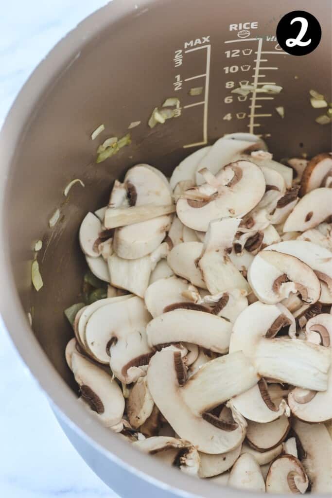 sliced mushrooms in a pressure cooker pot