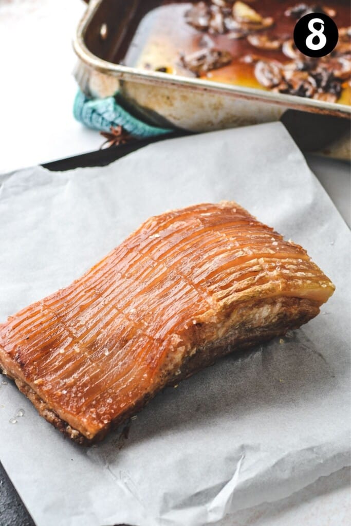 pork belly resting on an oven tray