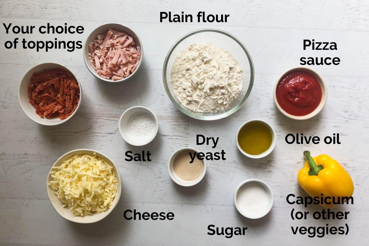 all ingredients for homemade pizza scrolls laid out on a table