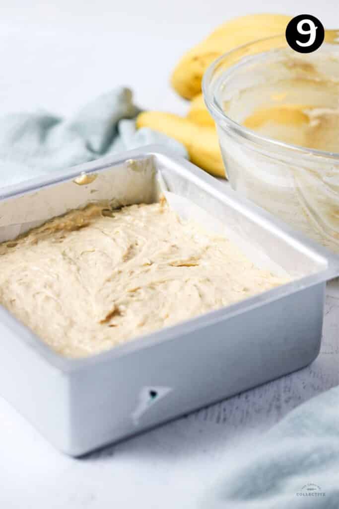 banana cake batter in a prepared baking tin