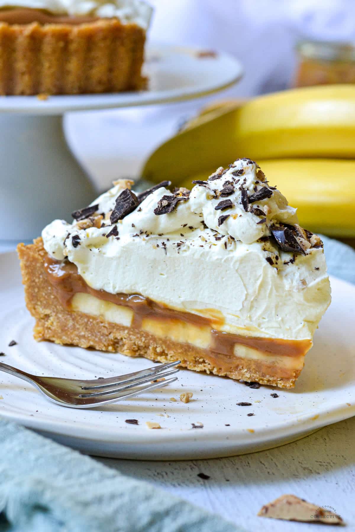 a piece of banoffee pie on a white plate