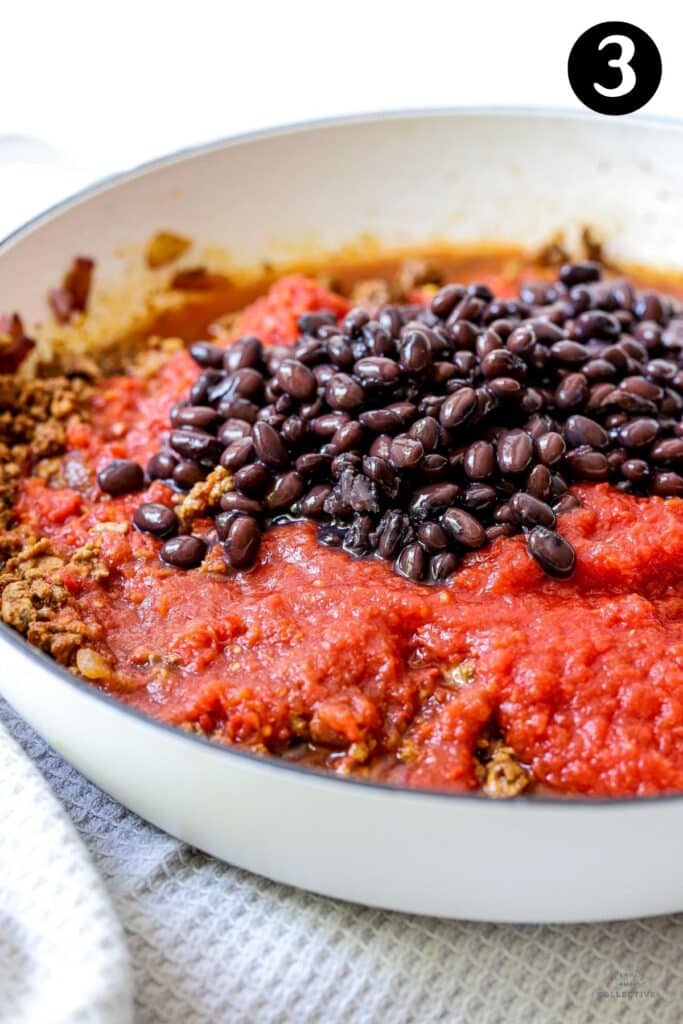 canned tomatoes and black beans added to beef mince