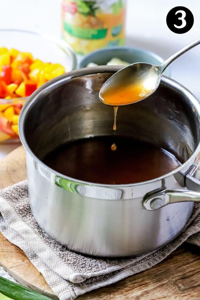 sweet and sour sauce in a saucepan