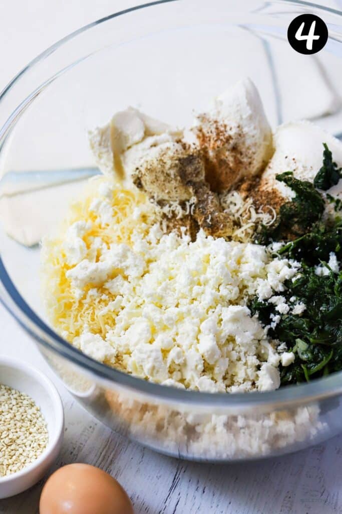 ingredients for spinach and ricotta filling in a glass bowl