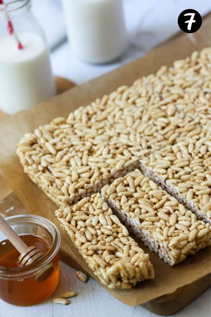 a slice cut into bars on a wooden board