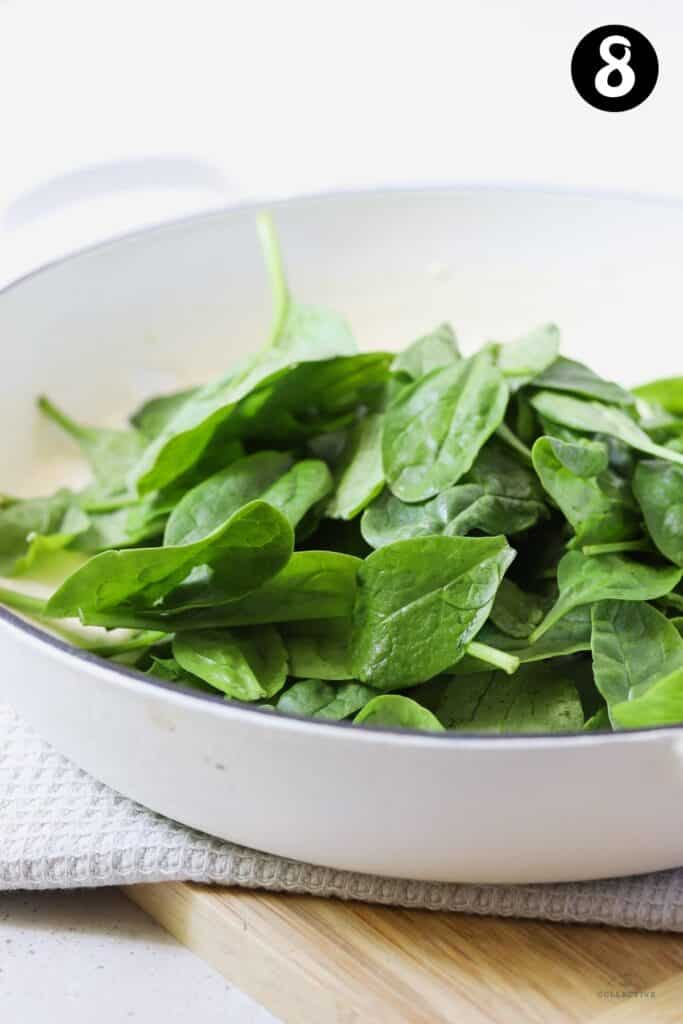 spinach leaves on top of 