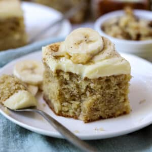 a slice of banana cake on a white plate