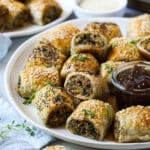 veggie sausage rolls arranged on a white plate