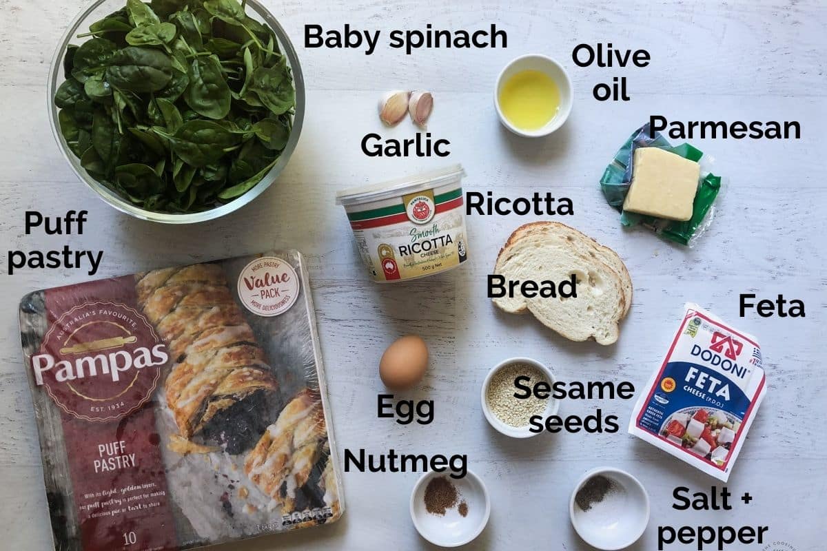 all ingredients for spinach and ricotta rolls laid out on a table