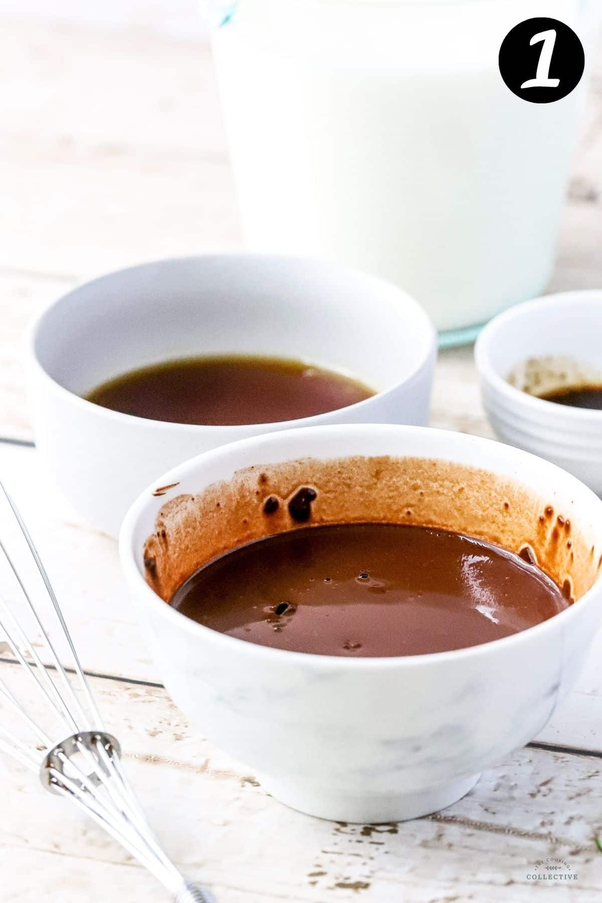 cocoa powder mixed with water in a white cup