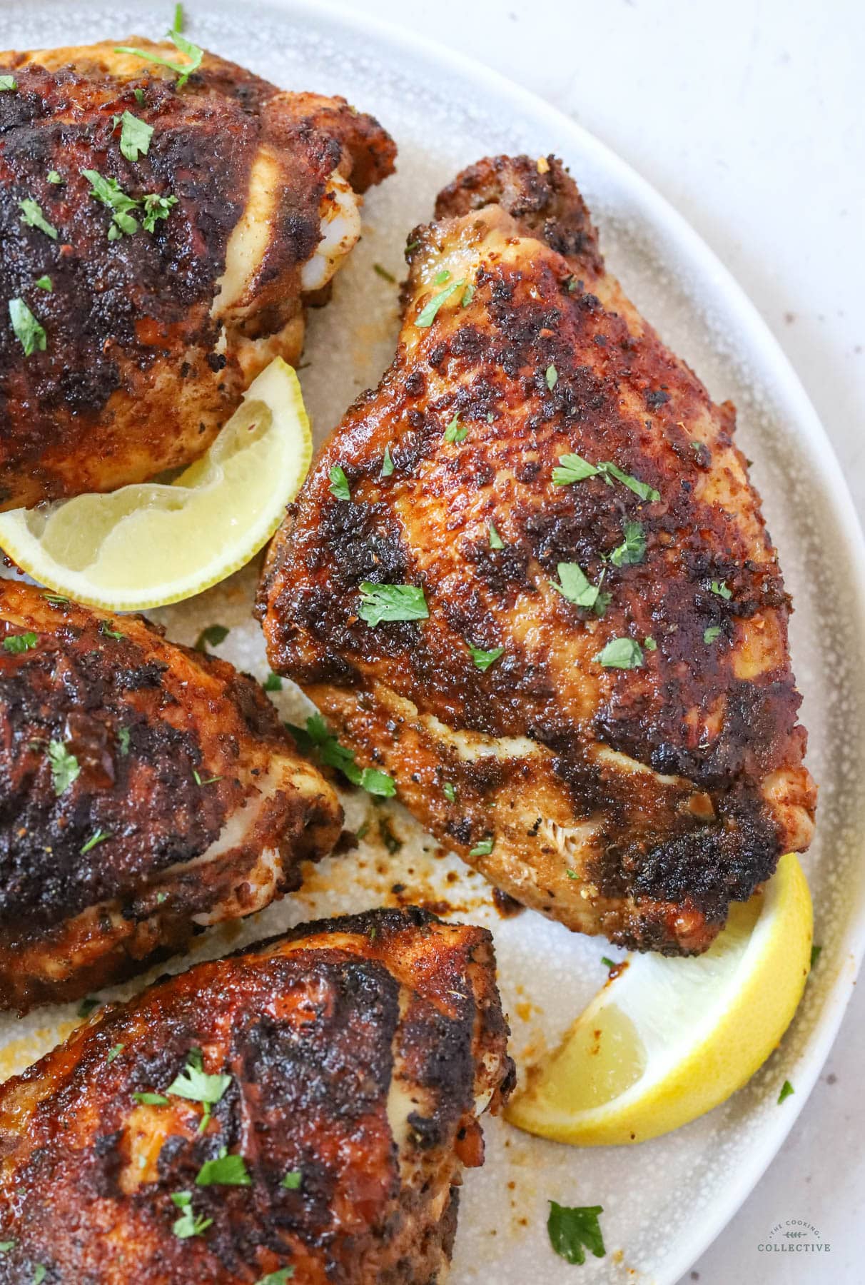 chicken thighs on a grey plate