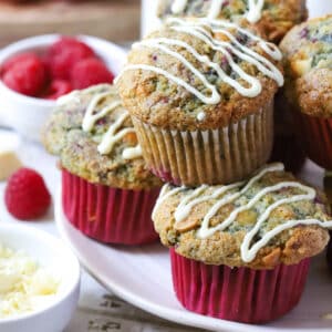 raspberry and white chocolate muffins on a white plate