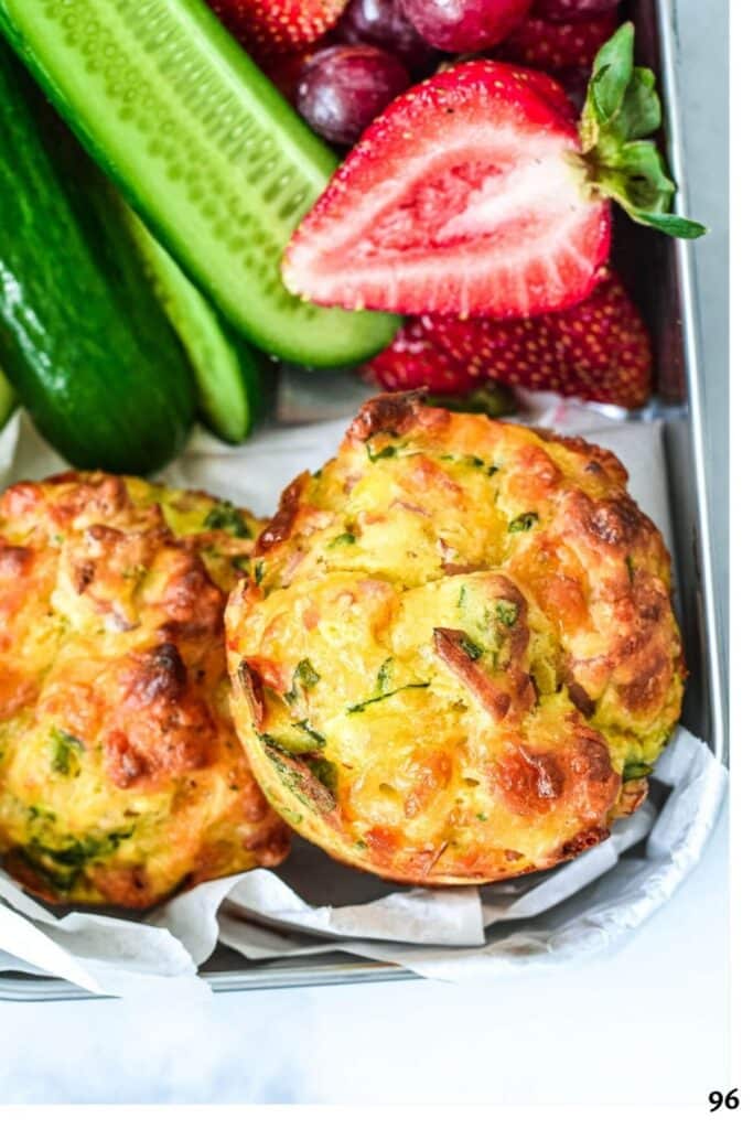 savoury muffins in a lunchbox with fruit