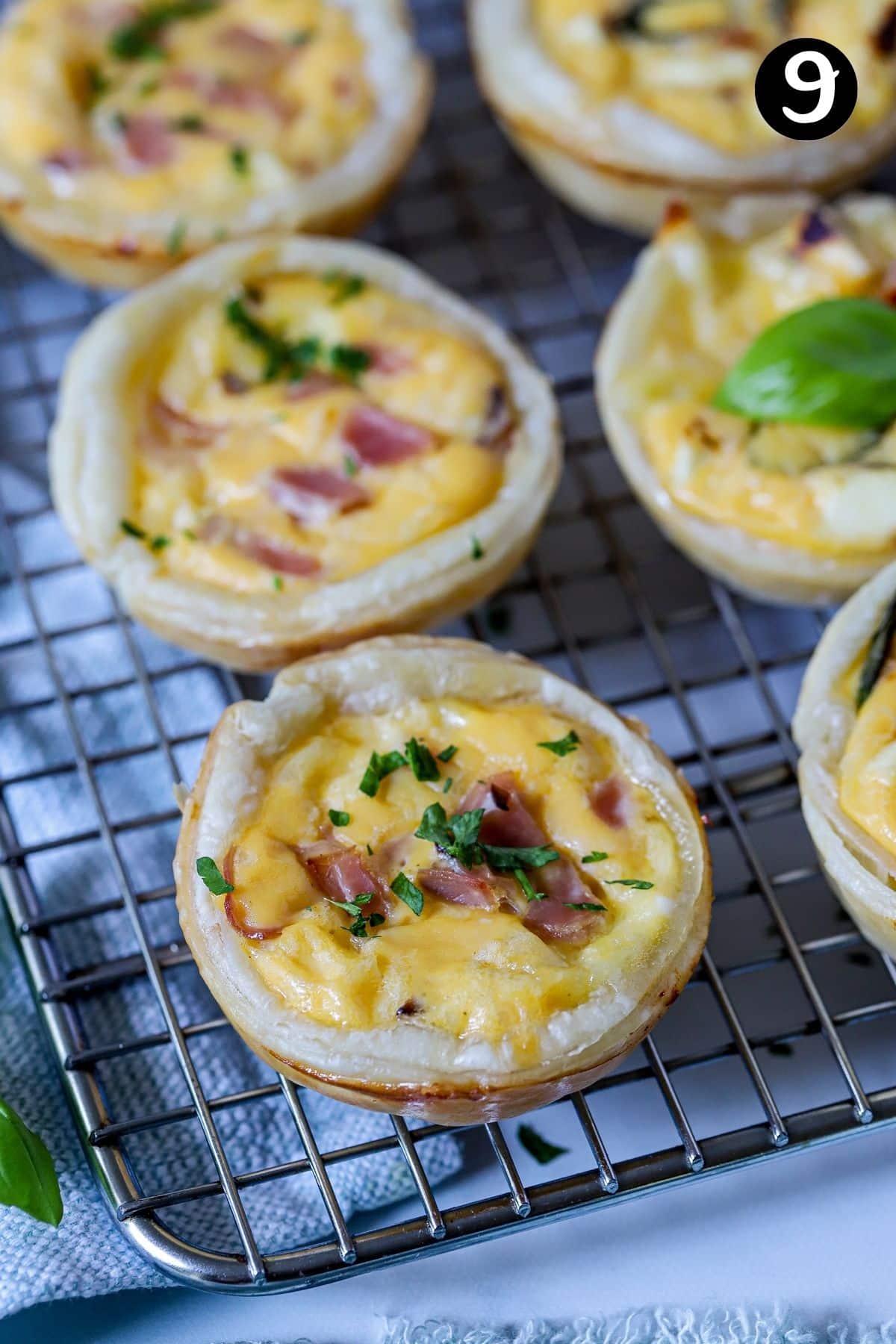 finished quiches cooling on a wire rack