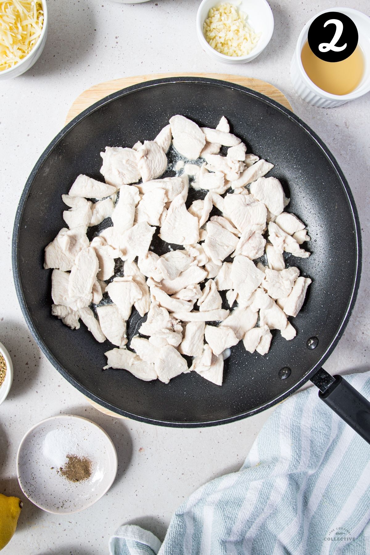 cooked chicken pieces in a frying pan