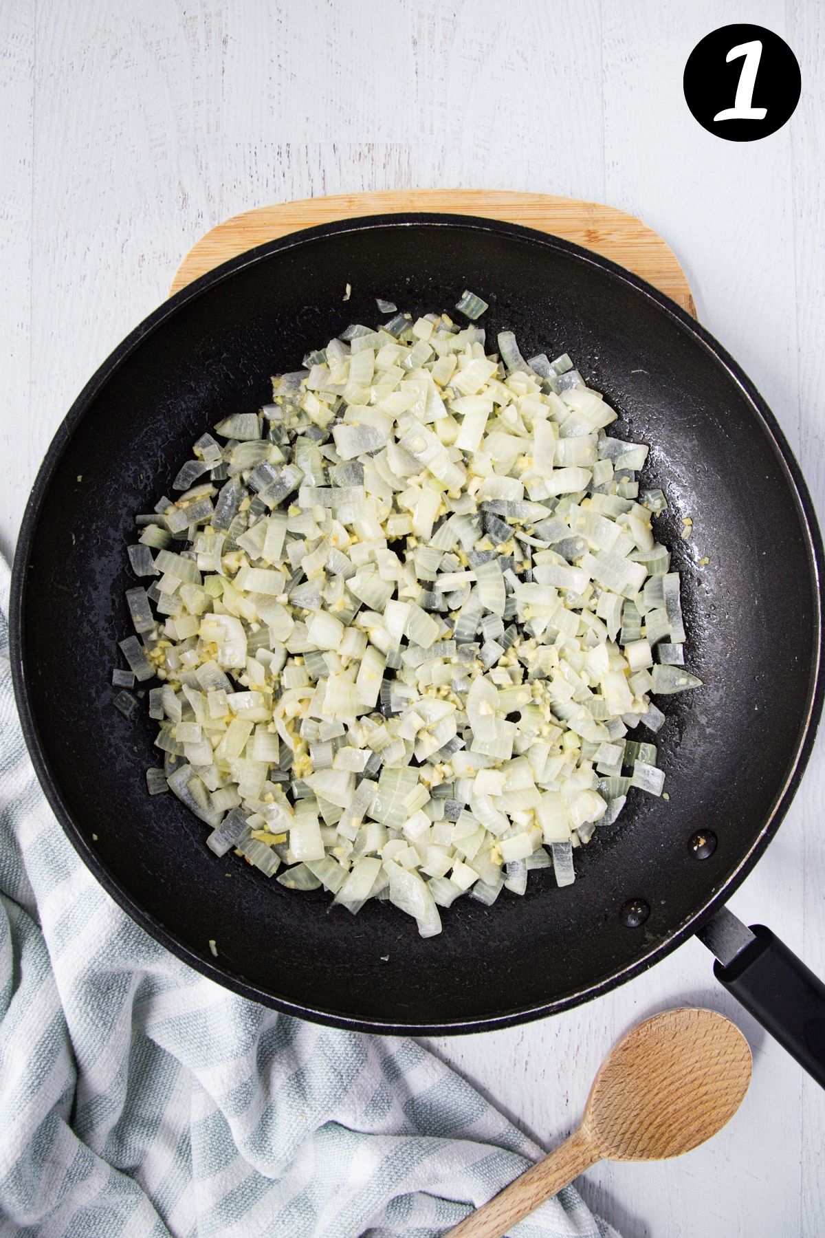 onion, garlic and ginger cooking in a pan