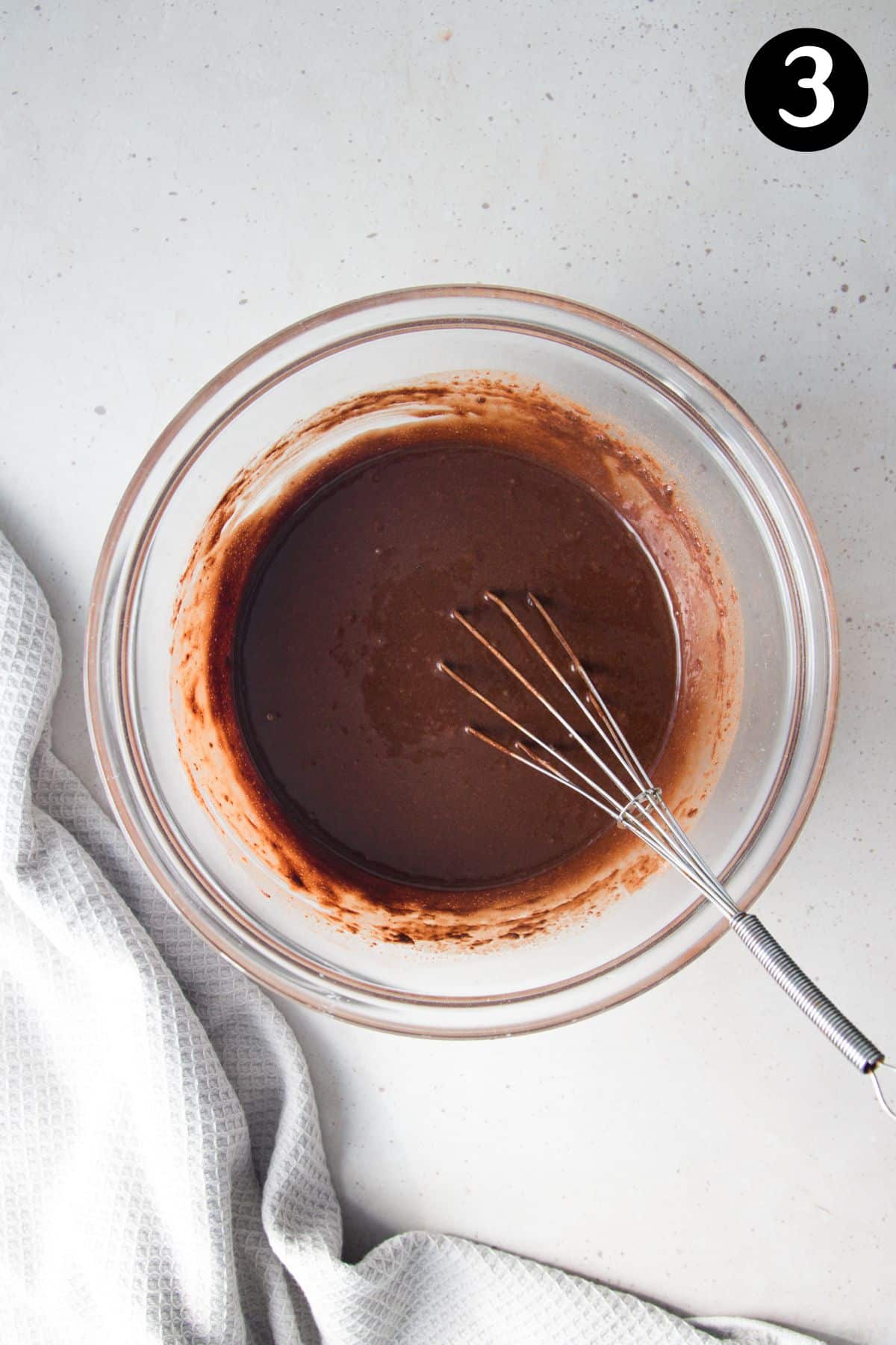 cupcake batter in a glass bowl.