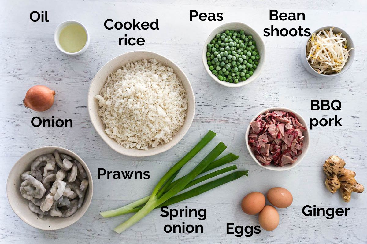 ingredients for prawn fried rice laid out on a table
