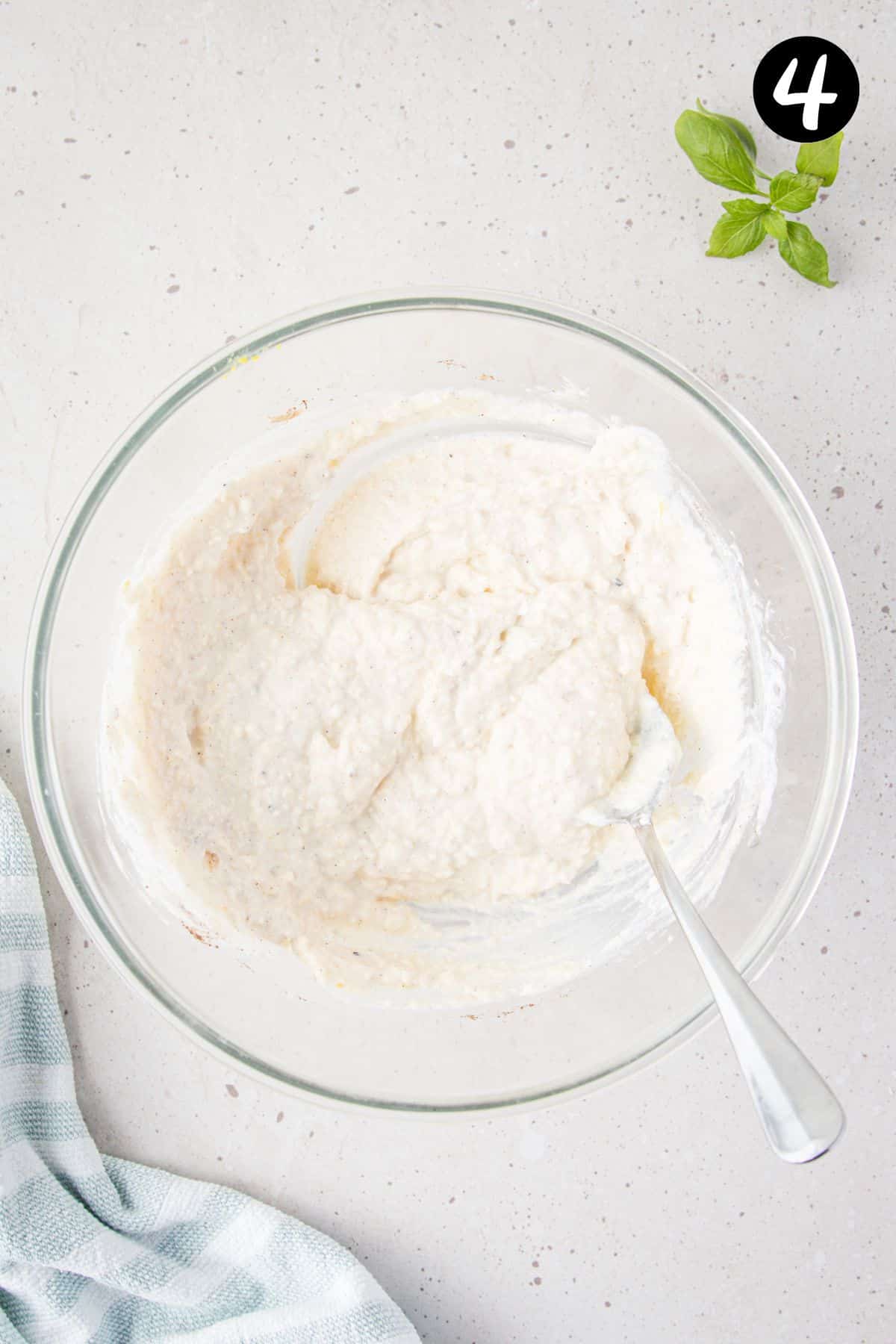 wet ingredients combined in a glass bowl.